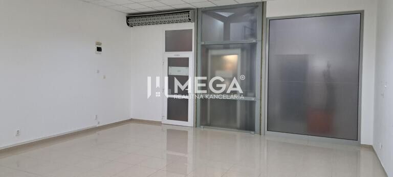 Spacious offices with ceramic flooring, glass doors, white walls, air conditioning.