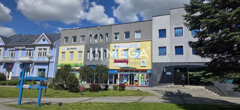 Commercial spaces on Freedom Square in Humenné, modern facades and display windows.