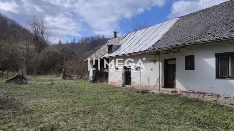 A family house in Čabiny on Čabiny Street, surrounded by nature with a spring atmosphere.