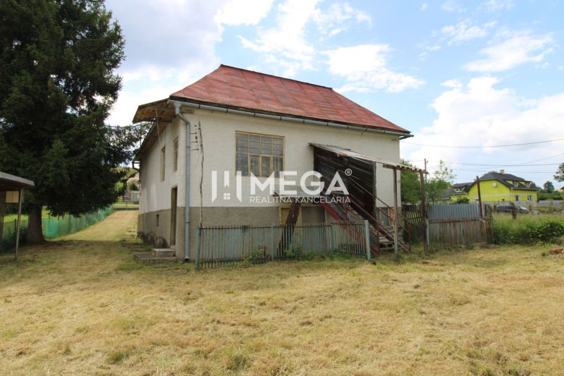 A family house in the village of Zbudská Belá on Zbudská Belá street with a large yard.