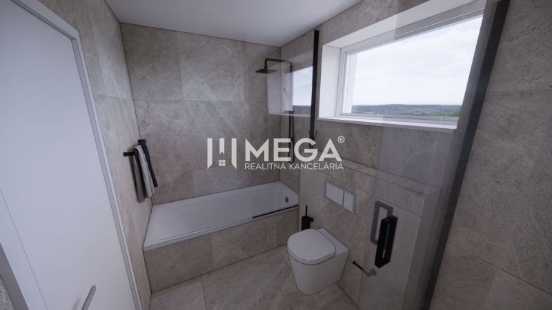 A bathroom with a bathtub and a window offers a view of the landscape. Family house.