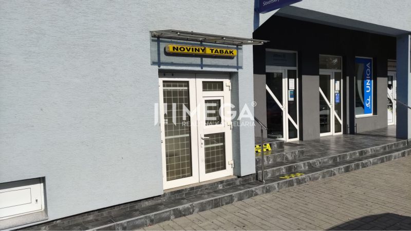 Commercial premises on Osloboditeľov Street in Humenné with entrance doors and a signboard.