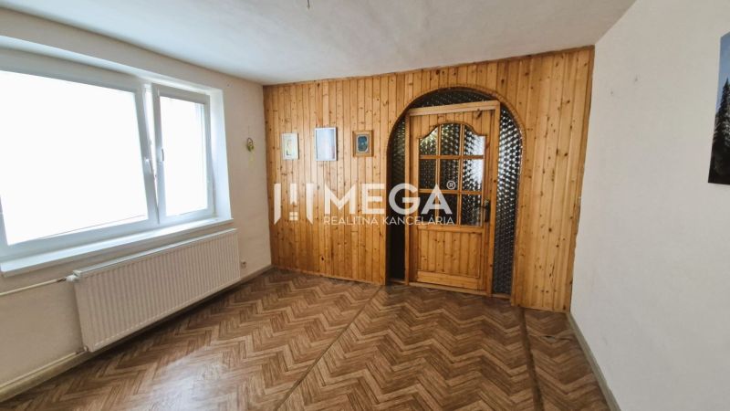 Interior with wood-patterned flooring and doors in a family house.
