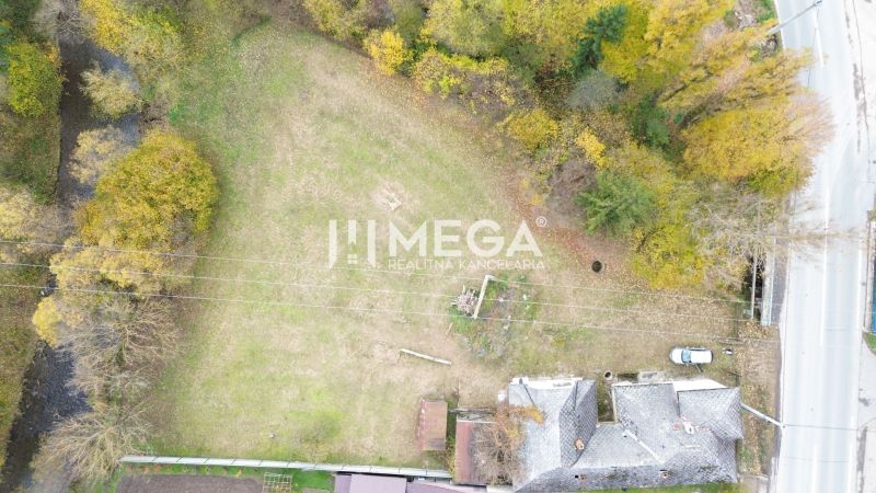 Aerial view of a residential plot on Československej armády Street in Stakčín surrounded by greenery.