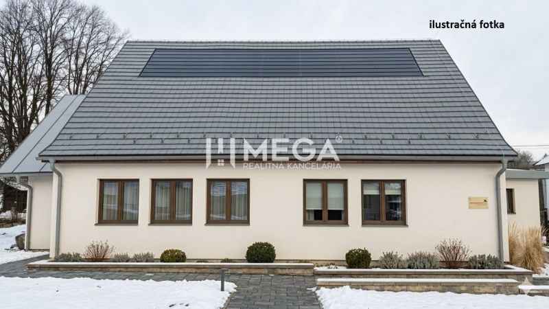 Commercial premises in Zboj with photovoltaics on the roof and a snowy environment.