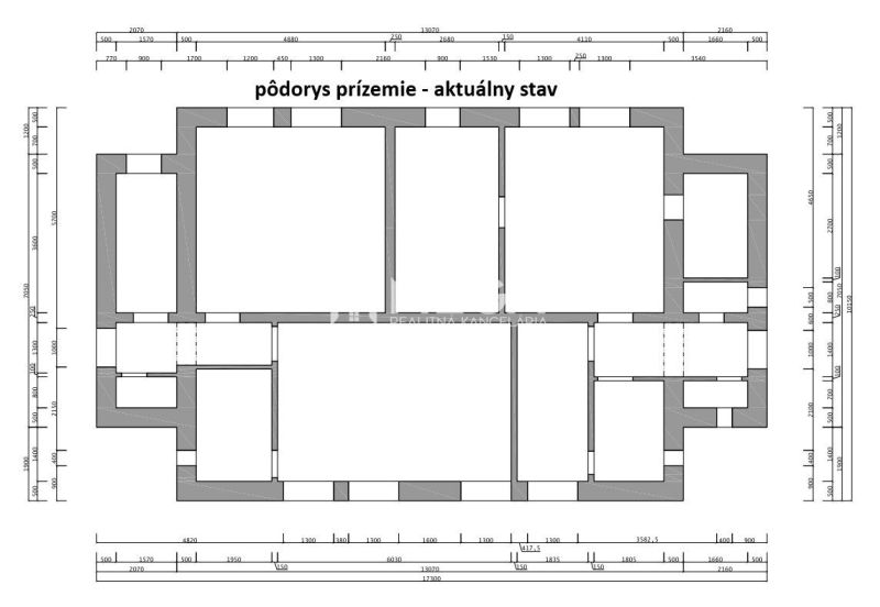 Floor plan of commercial spaces with storage rooms and corridors in the current state.