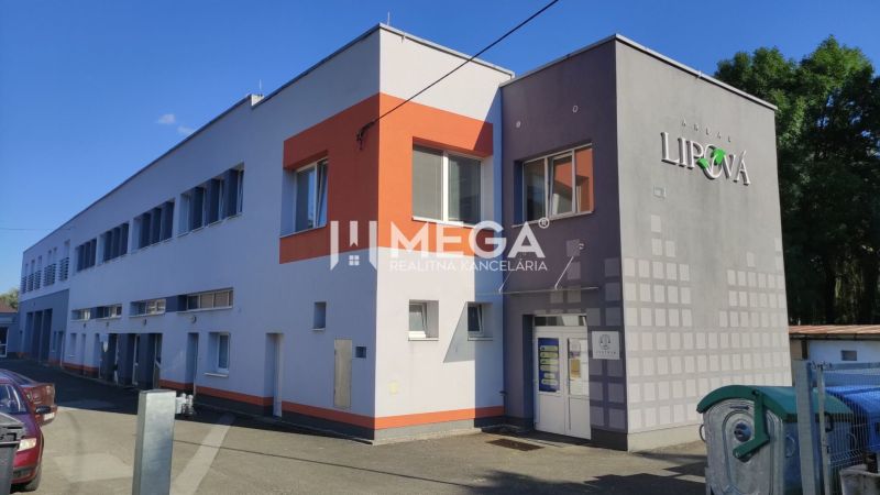Office building on Lipová Street in Humenné with a clean facade and parking.