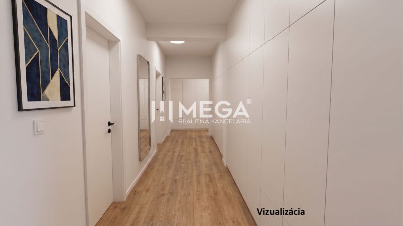 A hallway in a family house with a wooden decor floor and modern art on the wall.
