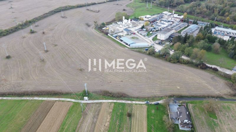 Aerial view of buildings and fields in Jasenov on Jasenov Street.