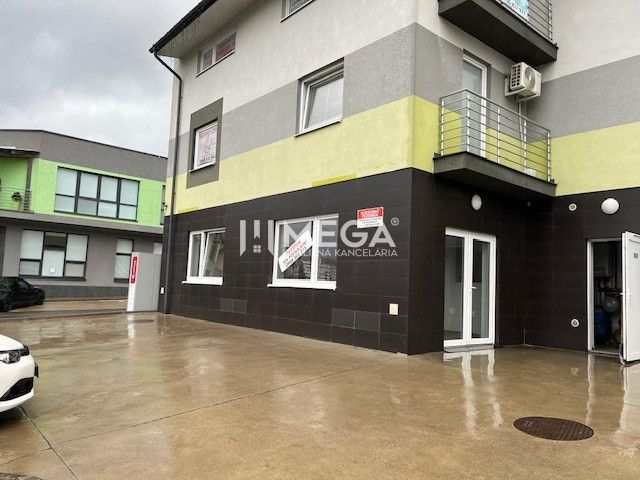 Commercial premises on Komenského Street in Snina with a modern facade and a balcony.