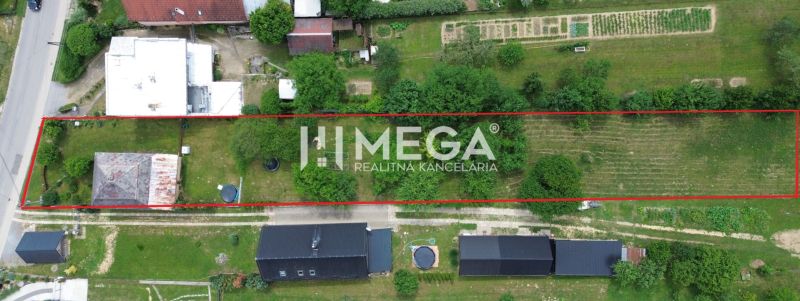 A family house on Jesenského Street in Snina with an extensive garden and greenery.