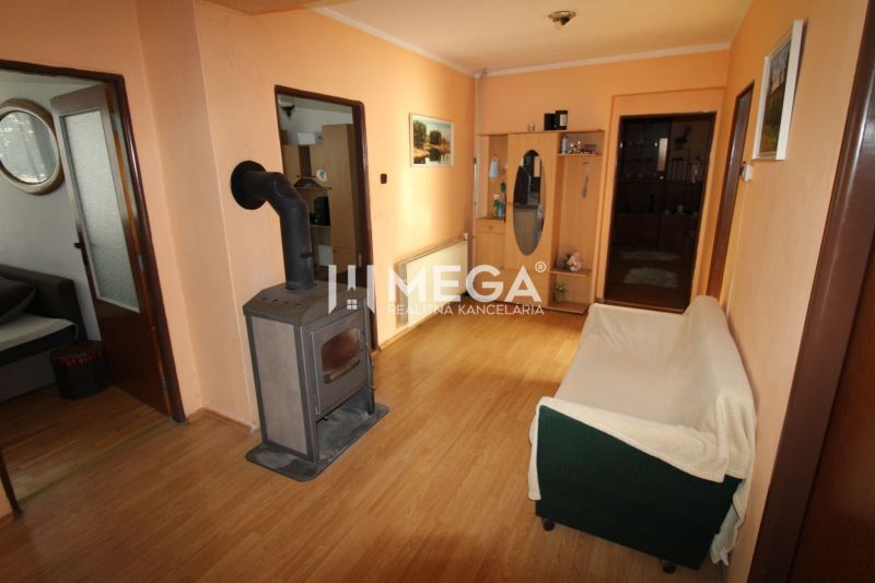 Interior of a family house with tiles and wooden decor flooring.