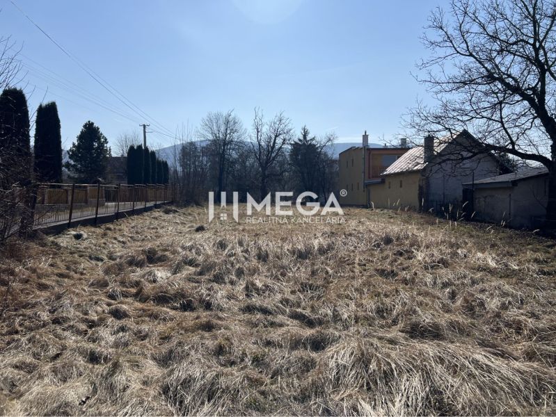 Lands - housing in Modra nad Cirochou with grassy area and visible buildings.