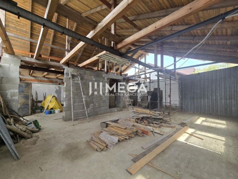 Reconstruction in a family house in Sokoľany on Sokoľany Street, exposed wooden beams.