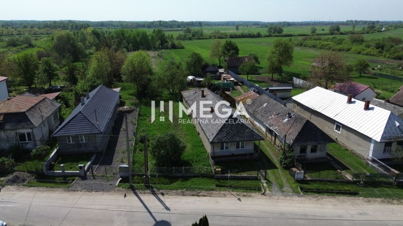 Aerial view of houses and gardens in Senne suitable for plots - housing.