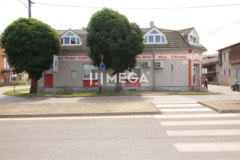 Shops on Duklianskych hrdinov Street in Vranov nad Topľou, with signs 