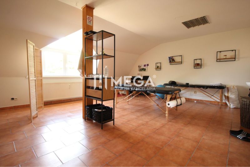 Commercial spaces with folding beds and shelves, floor with brick decor.