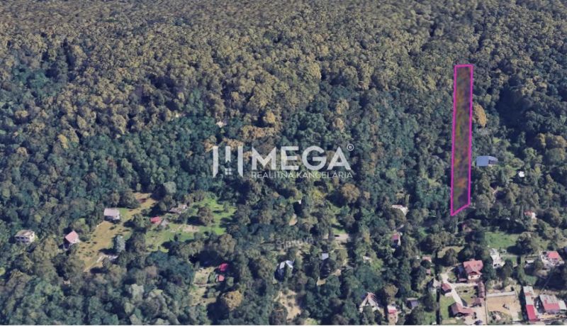 Aerial view of residential plots on Šípková Street, Košice IV, surrounded by forest.