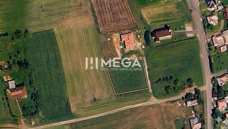 A satellite view of residential plots in the village of Víťazovce, surrounded by greenery and buildings.