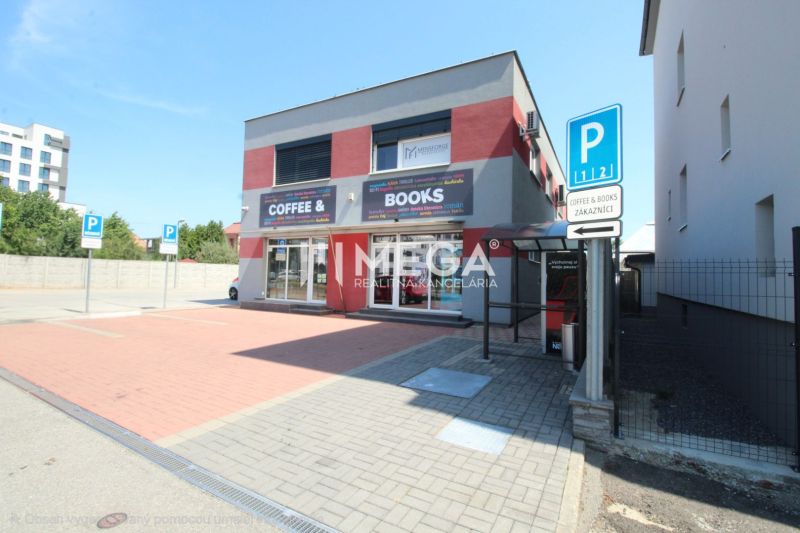 Offices on Sama Chalupka Street in Michalovce with a parking lot in front of the building.