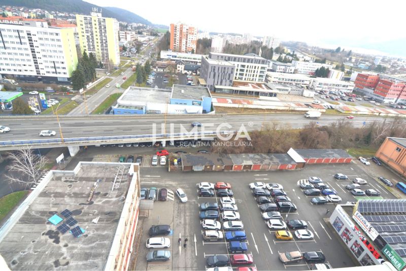 A view of the commercial premises on Štefánikova Street in Humenné with a parking lot.