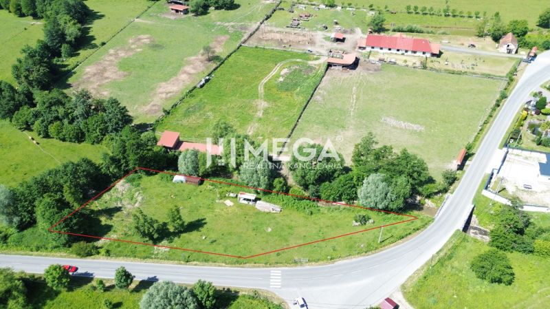 Plots - housing in Ptičie, surrounded by greenery near the main road.