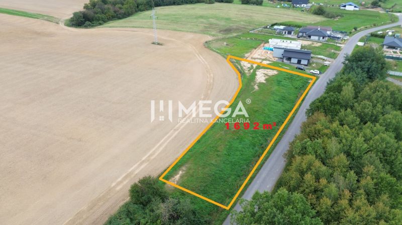 Residential land on Hámorská Street in Snina with an area of 1692 m².