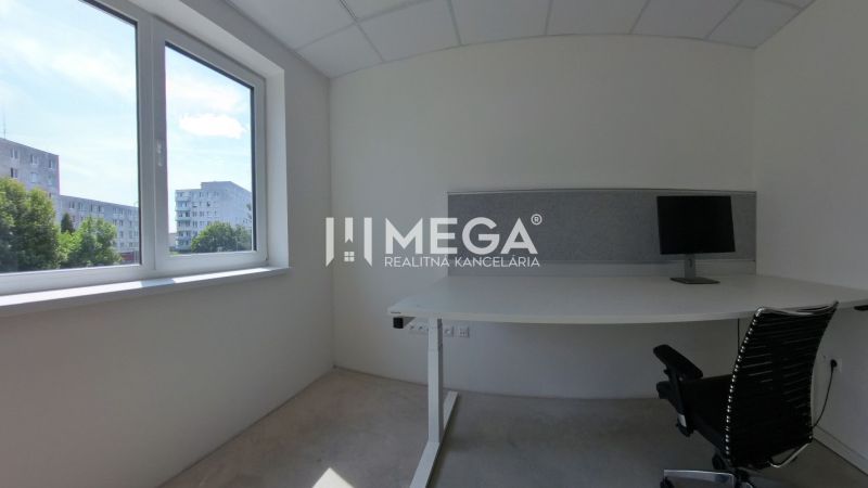 Office space with a desk, chair, and computer, view of Laborecká Street.