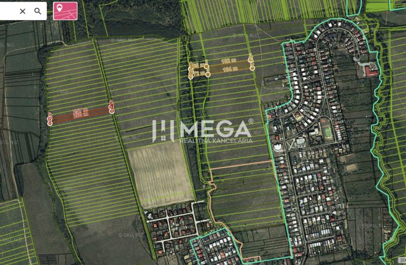 Aerial view of agricultural and forest land in the Humenné area.