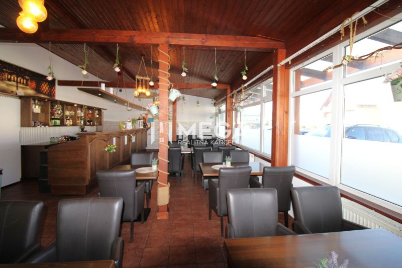 Interior of gastro spaces with brown chairs and a wooden decor floor.