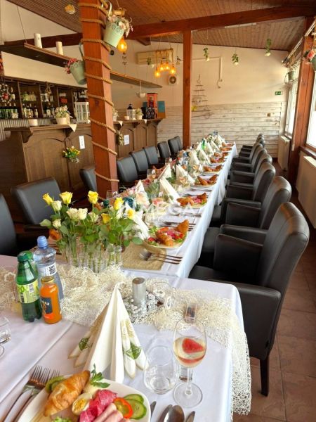Elegantly set tables with decorations in dining spaces creating a pleasant atmosphere.