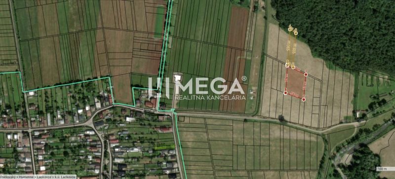 Aerial view of agricultural and forest land in Lackovce with marked boundaries.