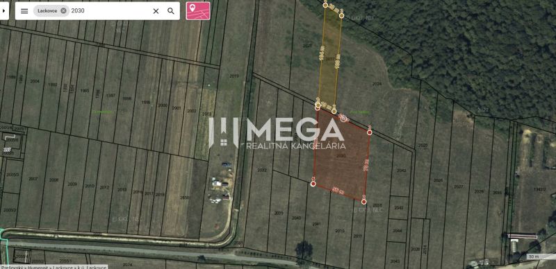 Aerial view of agricultural and forest land in Lackovce with marked parcels.