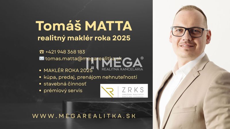 Real estate agent's business card with contact for MEGA real estate agency.