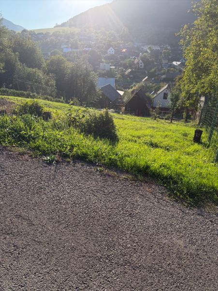 Sunny day in Košecké Podhradie with a view of the plots - living on the slope.
