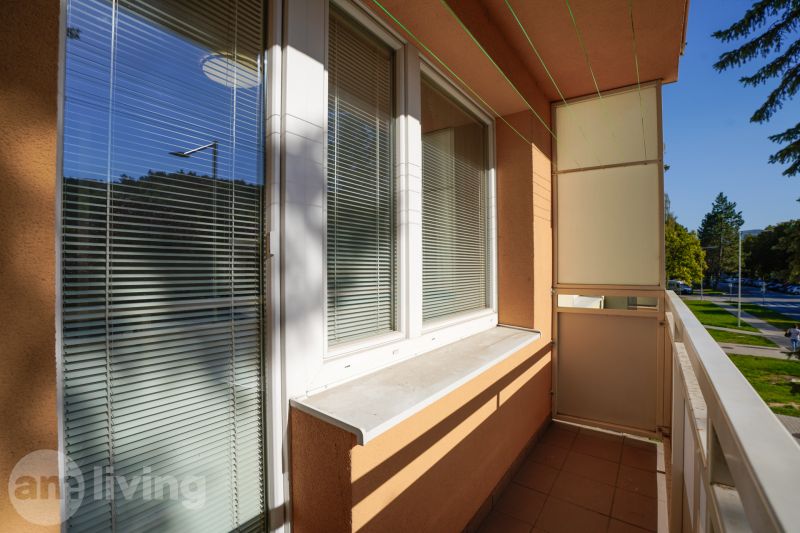 A balcony with a view of Trenčianska Street in Nová Dubnica, near a 1-bedroom apartment.