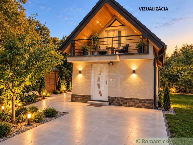 A cottage near Nové Zámky surrounded by greenery and illuminated exterior at dusk.