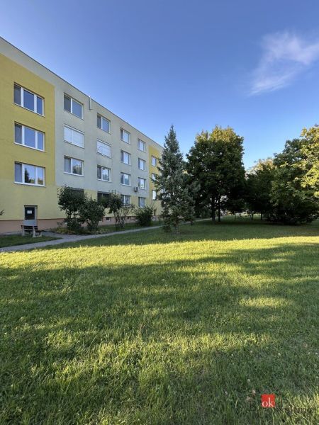 A housing estate with apartment buildings surrounded by greenery on Ďumbierska Street in Nitra.