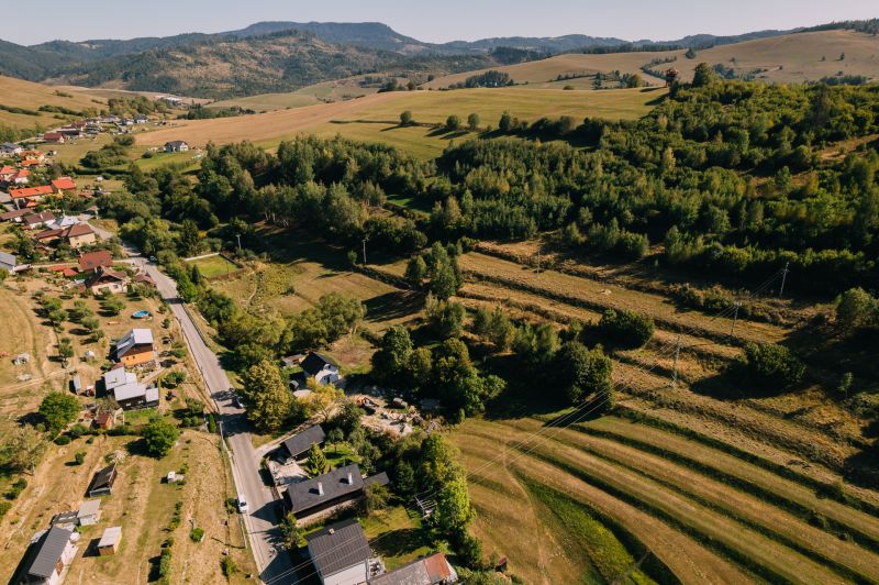 Aerial view of the landscape in Recreational Lands, Školská Street, Čierny Balog, surrounded by greenery.
