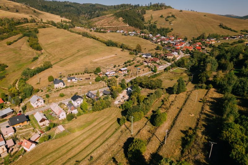 A top view of houses and landscape on Školská Street, Čierny Balog, Recreational plots.