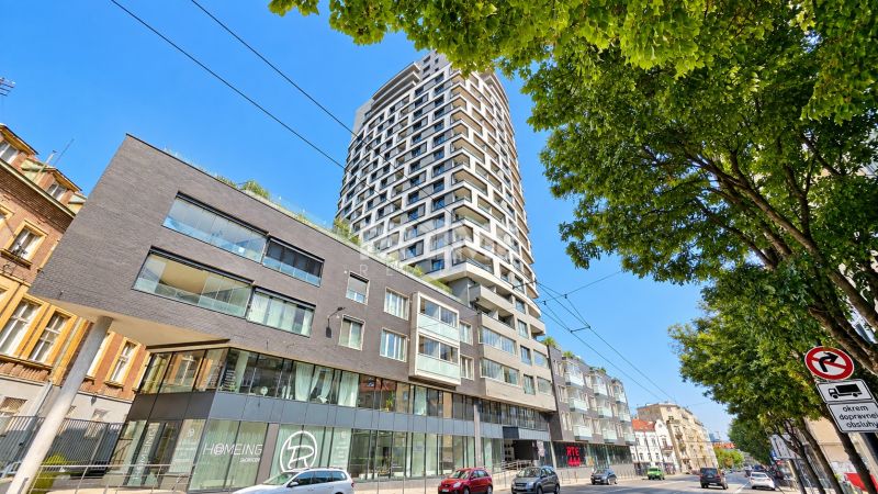 The building on Šancová Street in Bratislava – Staré Mesto, with modern architecture and greenery.