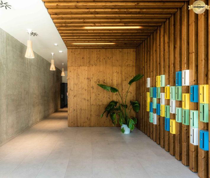 Interior with decorative elements and colorful mailboxes, Apartment construction.