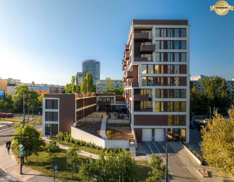 Construction of apartments on Mierová Street in Bratislava - Ružinov, with surrounding greenery.