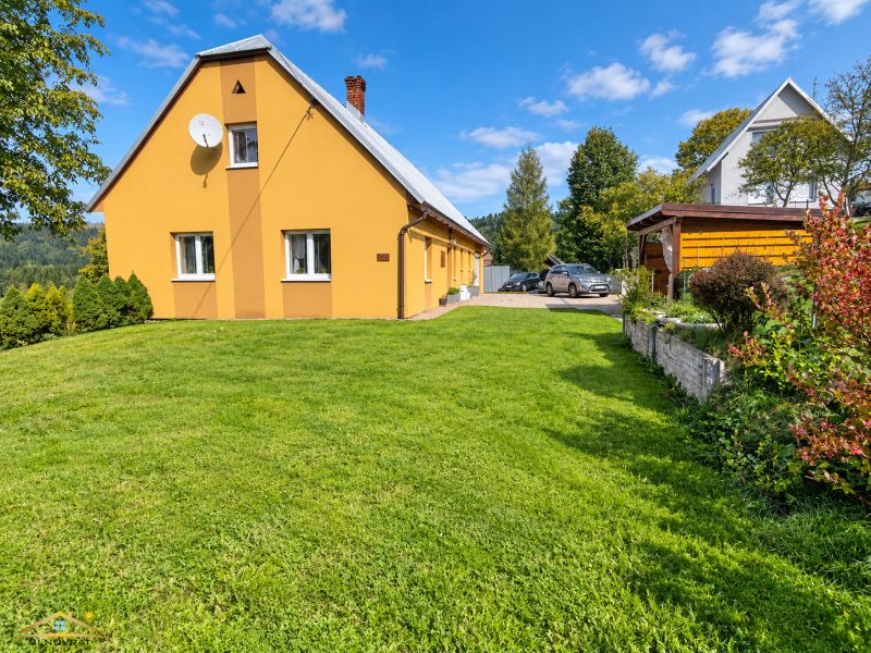 A family house in Oščadnica on Košariská Street with a garden and a gazebo.