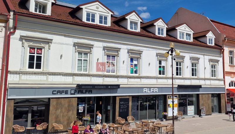 A building with a café and terrace on Sv. Egídia Square in Poprad, offices on the upper floor.