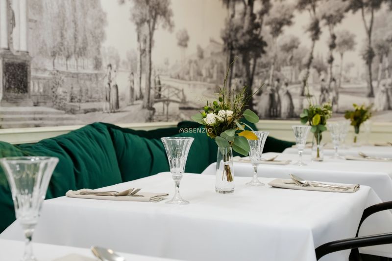 Stylish commercial spaces with rich decor and elegantly set tables.