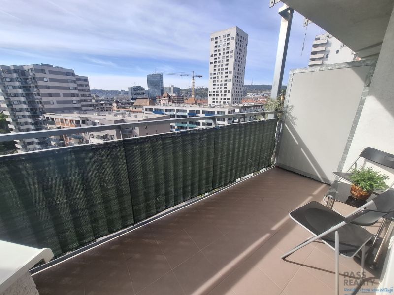 A balcony with a view of modern architecture in Bratislava-Ružinov, Jégeho, 2-room apartment.