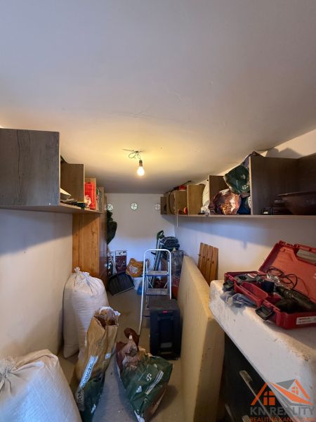 Storage space with shelves and tools, Family house.