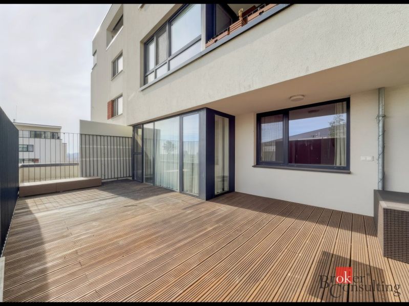 Terrace with wood decor flooring in a 2-room apartment, Svätovavrinecká, Bratislava-Nové Mesto.