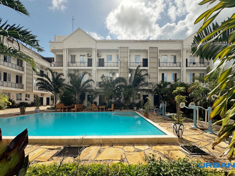 Residence in Mbweni, Zanzibar with a pool and tropical garden.
